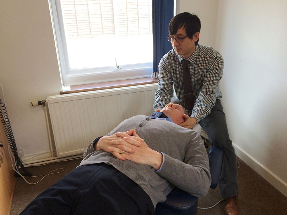 neck-adjustment - Chiropractic Wellness Centre